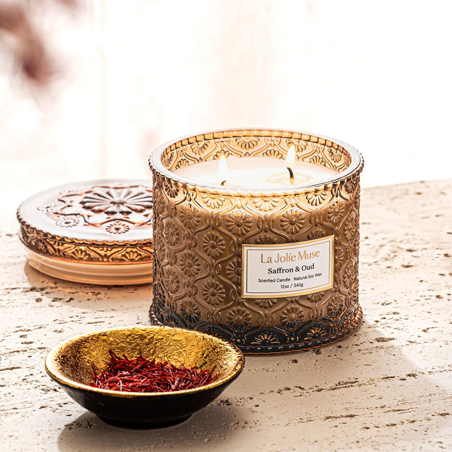 Home fragrance products including candles and diffusers