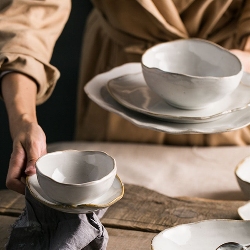 Kitchen and dining essentials including cookware and tableware