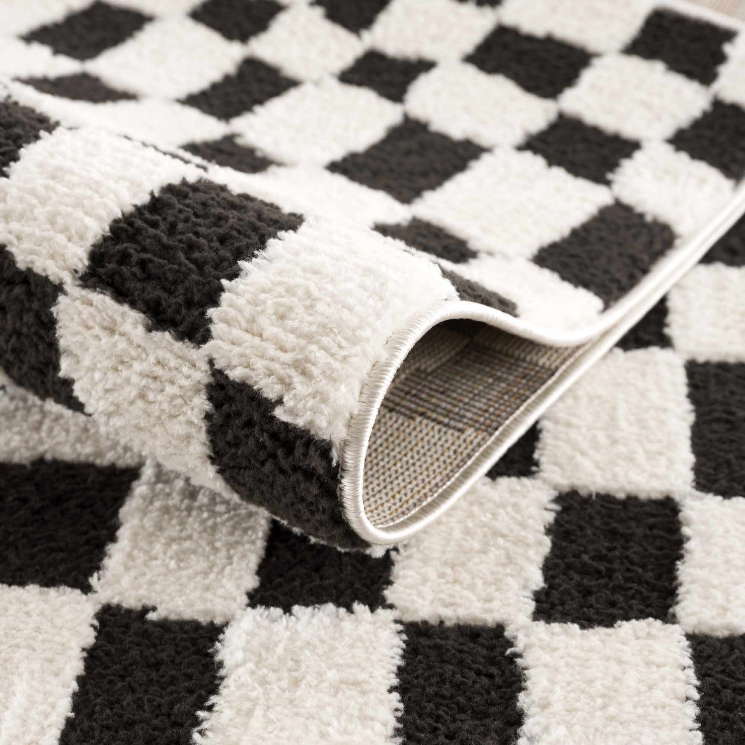 Lajos Black &amp; White Checkered Plush Rug